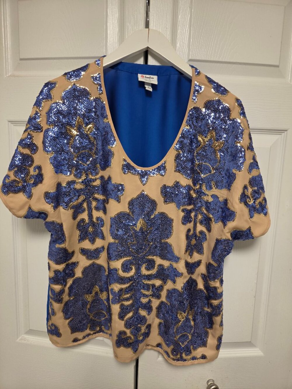 Beige top with beautiful blue beads detailing
